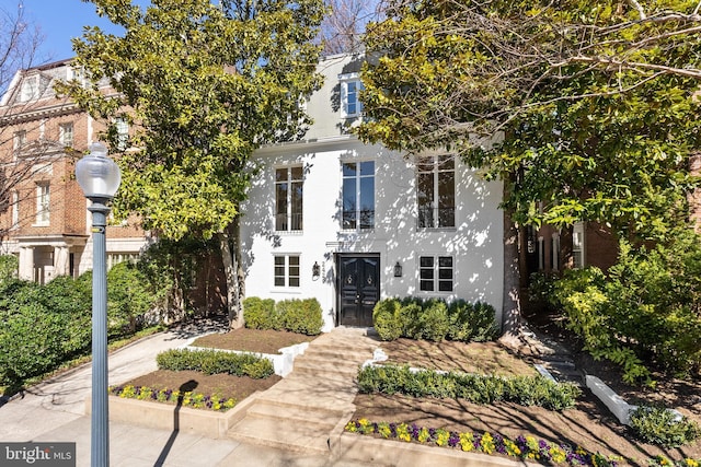 view of property featuring stucco siding