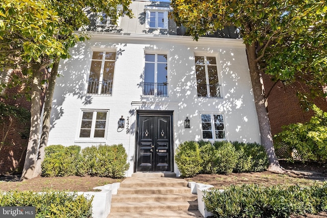 view of front of property with brick siding