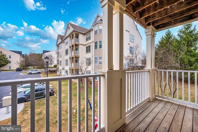 balcony featuring a residential view