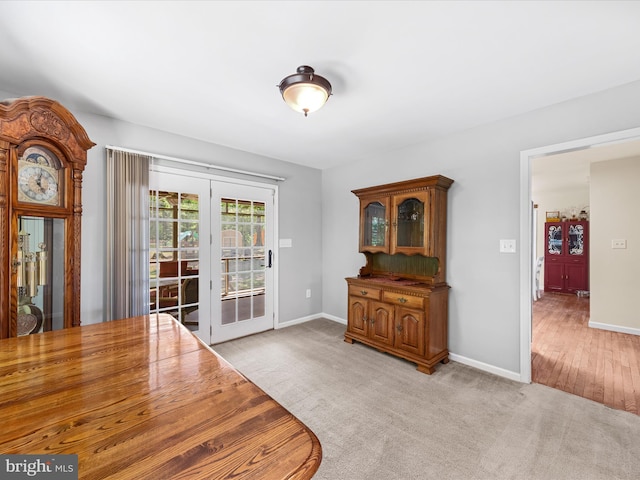 2446 Saint Lukes Rd, Salisbury, MD 21804 - dining space featuring french doors, baseboards, and light colored carpet