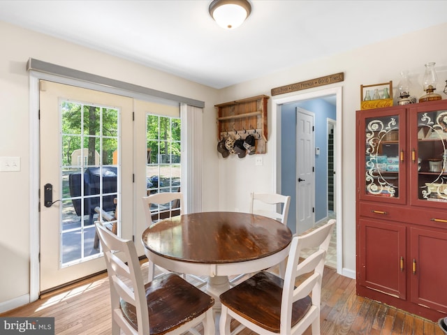 2446 Saint Lukes Rd, Salisbury, MD 21804 - dining space with wood-type flooring and baseboards