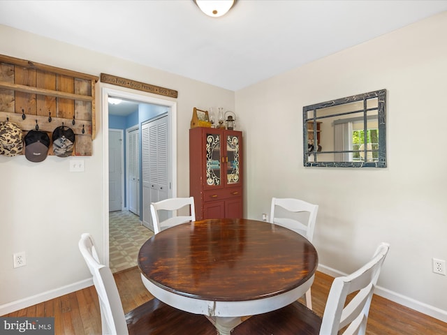 2446 Saint Lukes Rd, Salisbury, MD 21804 - dining room featuring baseboards and wood finished floors