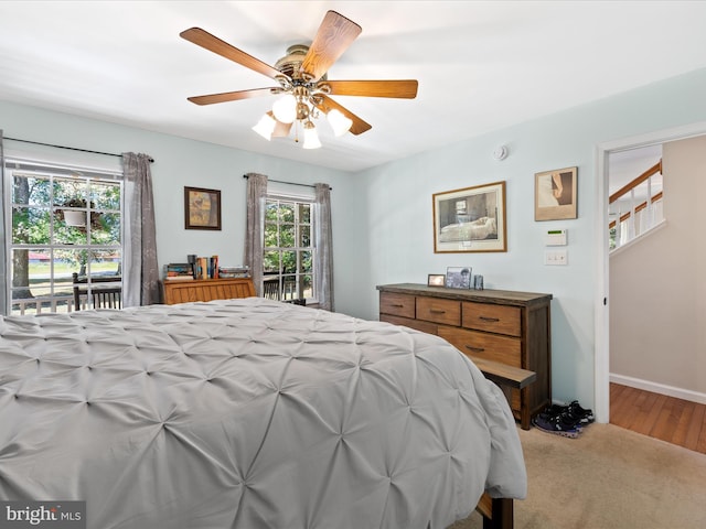 2446 Saint Lukes Rd, Salisbury, MD 21804 - bedroom with access to exterior, a ceiling fan, baseboards, and carpet