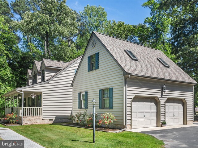 2446 Saint Lukes Rd, Salisbury, MD 21804 - view of front of home featuring roof with shingles, a front lawn, asphalt driveway, and a garage