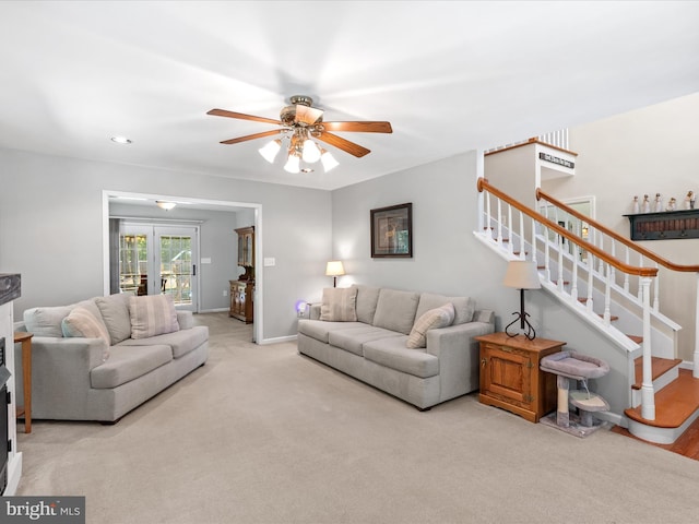 2446 Saint Lukes Rd, Salisbury, MD 21804 - living room featuring a ceiling fan, stairway, baseboards, and carpet flooring