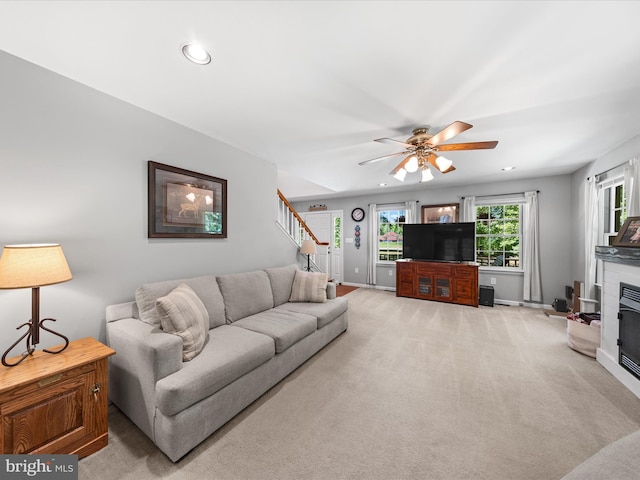 2446 Saint Lukes Rd, Salisbury, MD 21804 - living area featuring stairway, recessed lighting, light colored carpet, ceiling fan, and baseboards