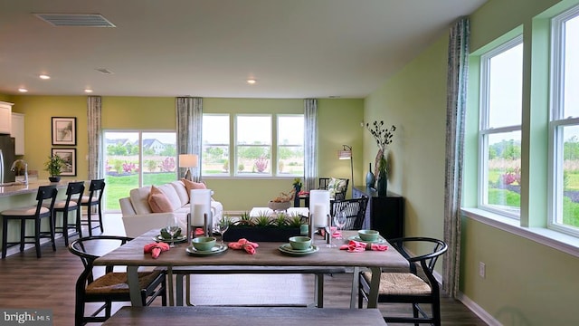 dining space featuring recessed lighting, dark wood-style floors, and visible vents