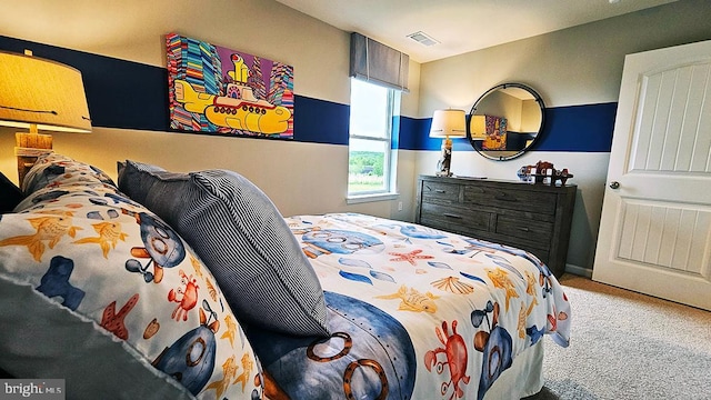 bedroom featuring carpet flooring and visible vents