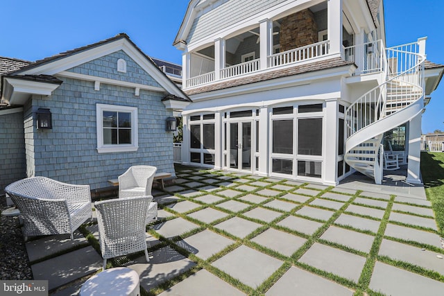 1 103rd St, Stone Harbor, NJ 08247 - rear view of house with stairway, a patio area, and french doors