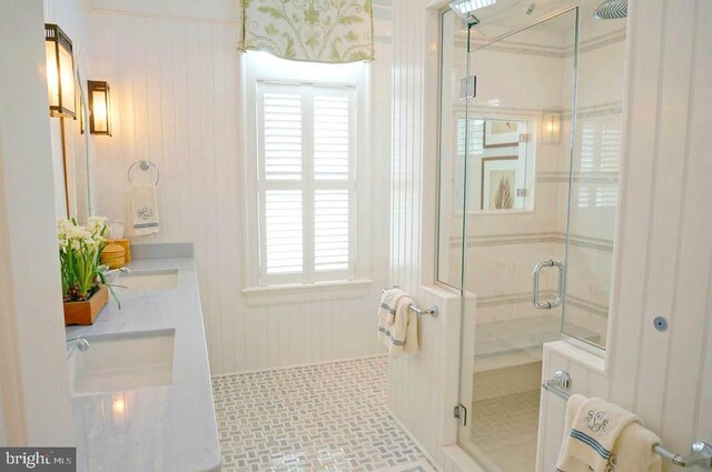 1 103rd St, Stone Harbor, NJ 08247 - bathroom with double vanity and a stall shower