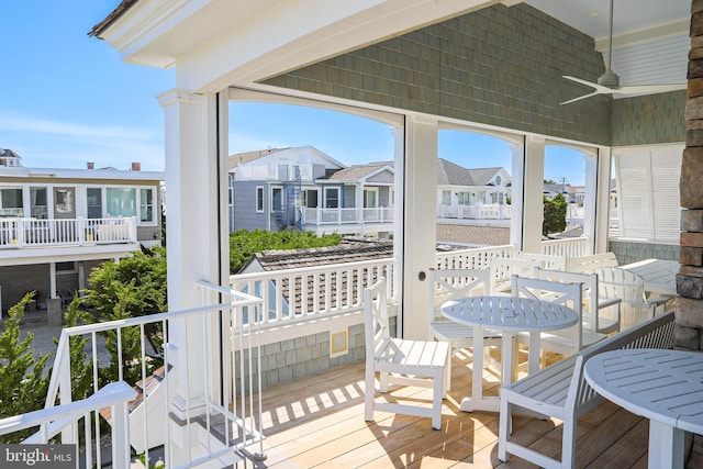 1 103rd St, Stone Harbor, NJ 08247 - wooden terrace featuring a residential view and ceiling fan