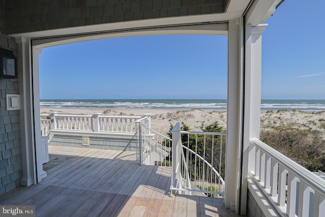 1 103rd St, Stone Harbor, NJ 08247 - wooden deck with a beach view and a water view