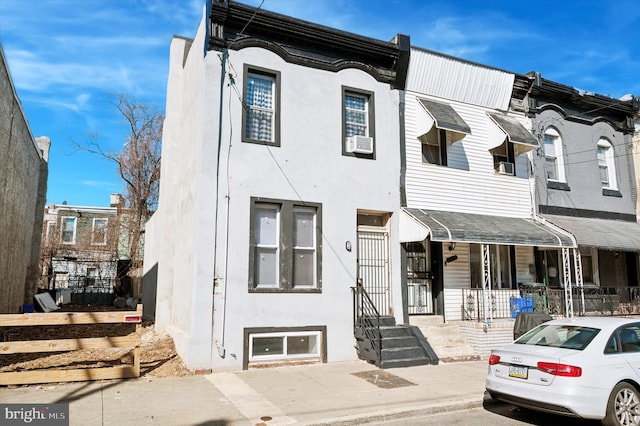 multi unit property featuring stucco siding