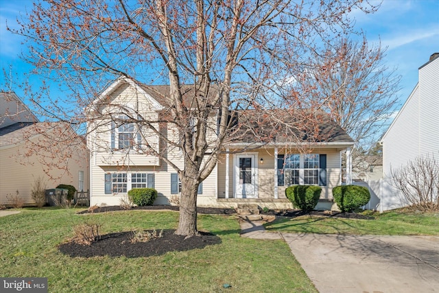 split level home with a front yard