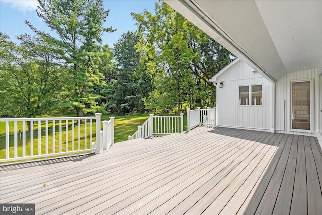 wooden terrace with a yard