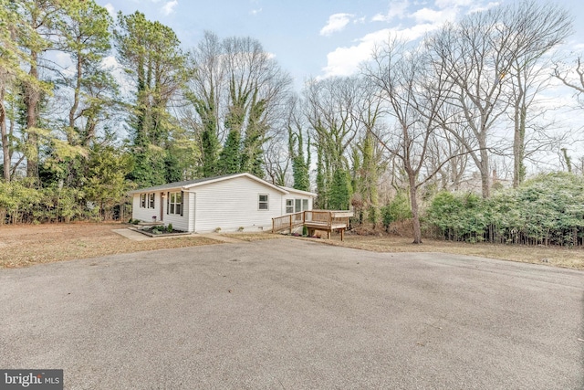 view of front of home with a deck