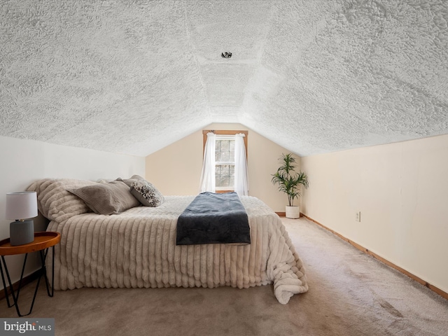 carpeted bedroom with a textured ceiling, baseboards, and vaulted ceiling