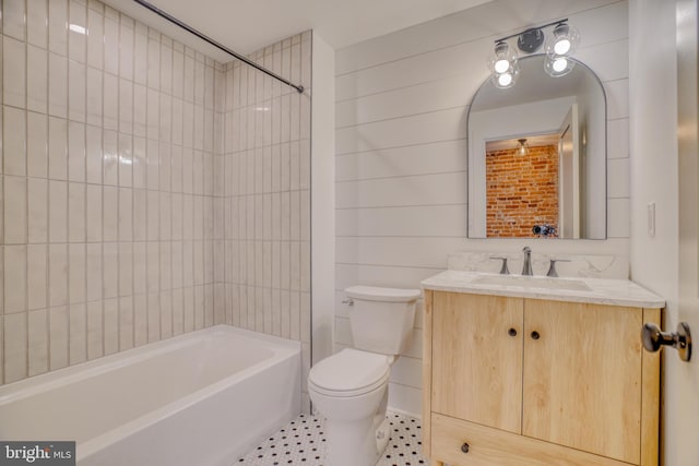 full bath with toilet,  shower combination, and vanity