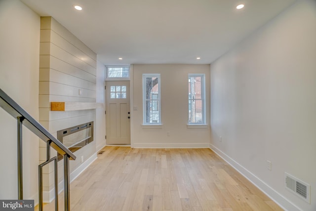 entryway featuring a wealth of natural light, visible vents, recessed lighting, and light wood finished floors