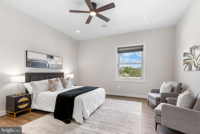 bedroom featuring recessed lighting, ceiling fan, baseboards, and wood finished floors