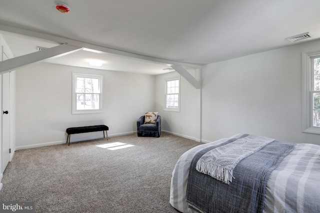 bedroom featuring visible vents, baseboards, and carpet floors