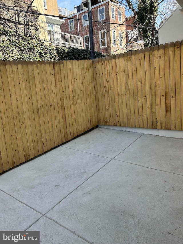 view of patio with fence