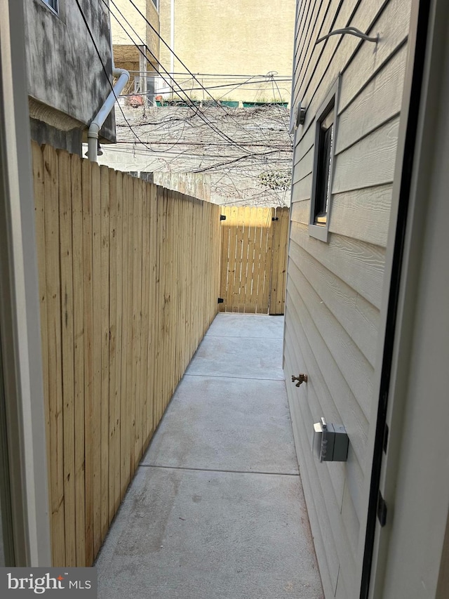 view of patio / terrace featuring fence