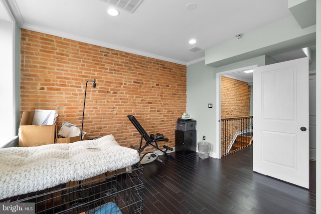 444 Grindall St, Baltimore, MD 21230 - bedroom featuring brick wall, wood finished floors, baseboards, recessed lighting, and crown molding
