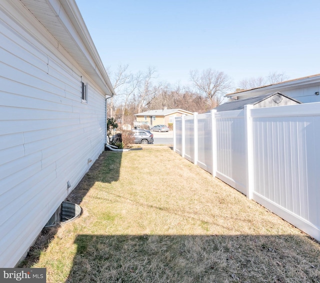 view of yard with fence