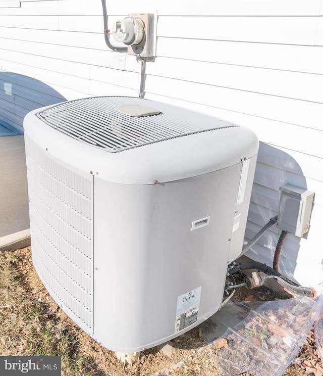 exterior details with central AC and electric meter