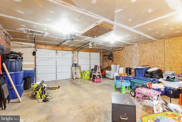 garage featuring a garage door opener