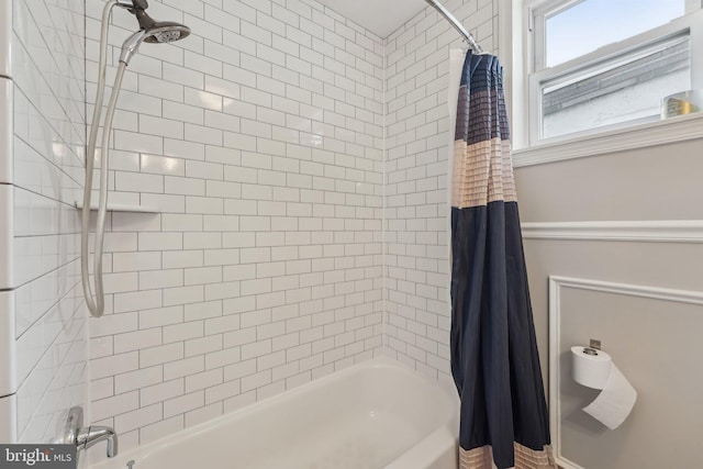 full bath featuring shower / tub combo with curtain