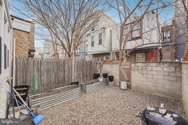 view of yard featuring a fenced backyard