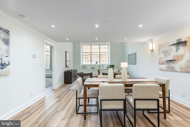 dining space featuring a wealth of natural light, recessed lighting, light wood-type flooring, and baseboards