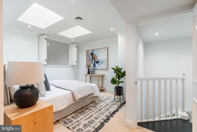 bedroom with recessed lighting, visible vents, carpet floors, and ornamental molding