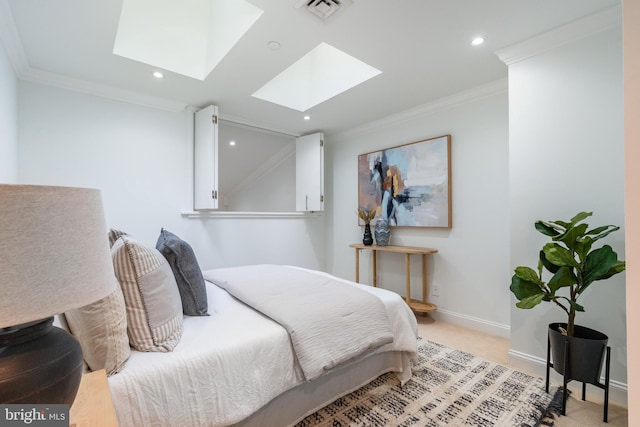 bedroom with visible vents, a skylight, baseboards, and ornamental molding