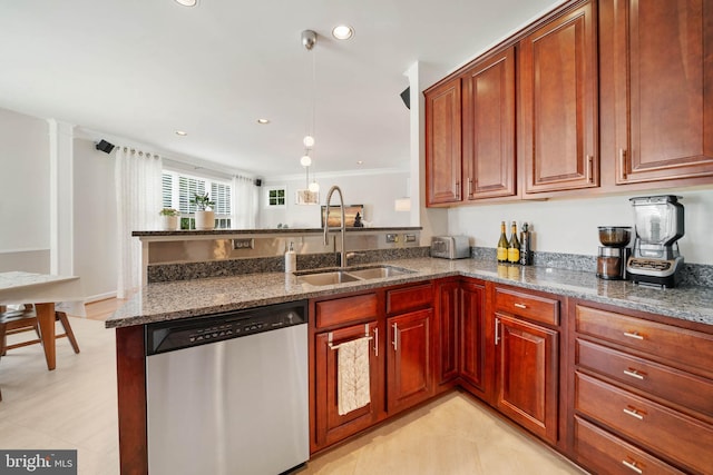 kitchen featuring stone counters, a peninsula, recessed lighting, a sink, and dishwasher