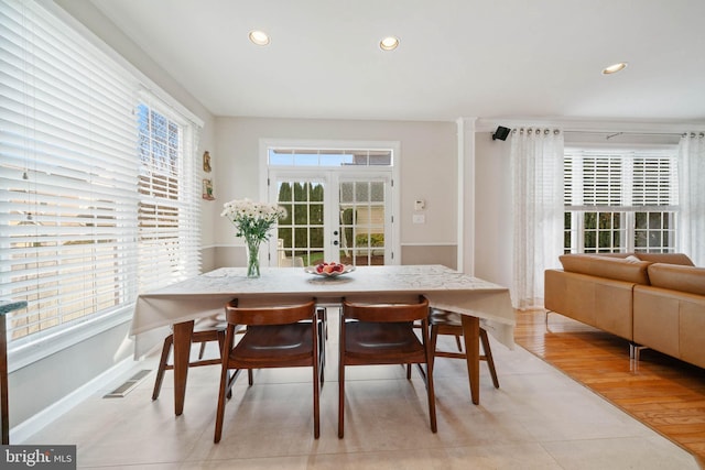 dining space featuring visible vents, recessed lighting, french doors, light tile patterned floors, and baseboards