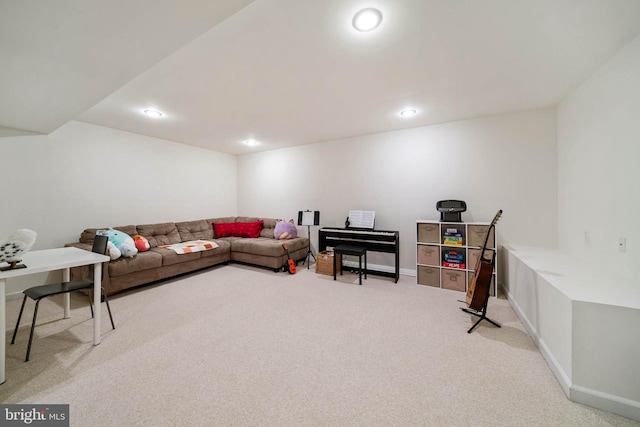 living area featuring recessed lighting, light colored carpet, and baseboards