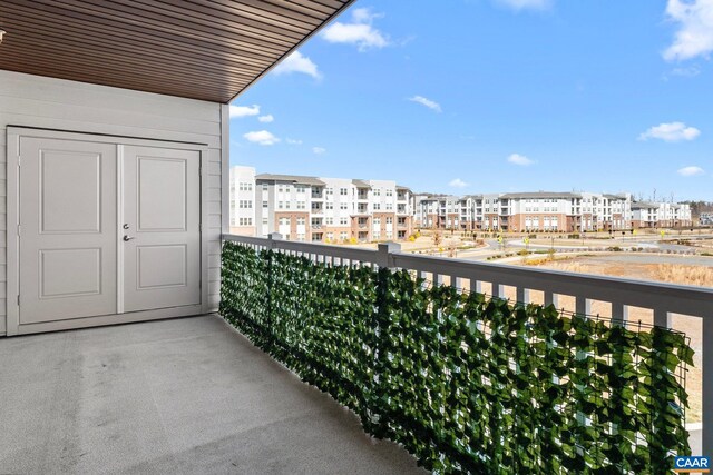 balcony featuring a residential view