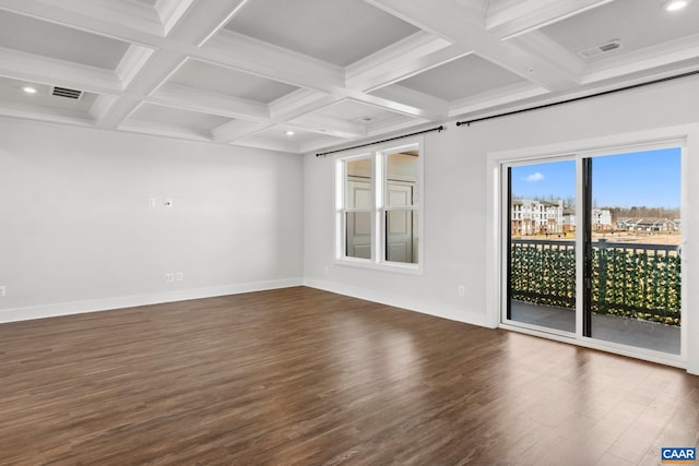 empty room featuring baseboards, visible vents, coffered ceiling, dark wood finished floors, and beamed ceiling