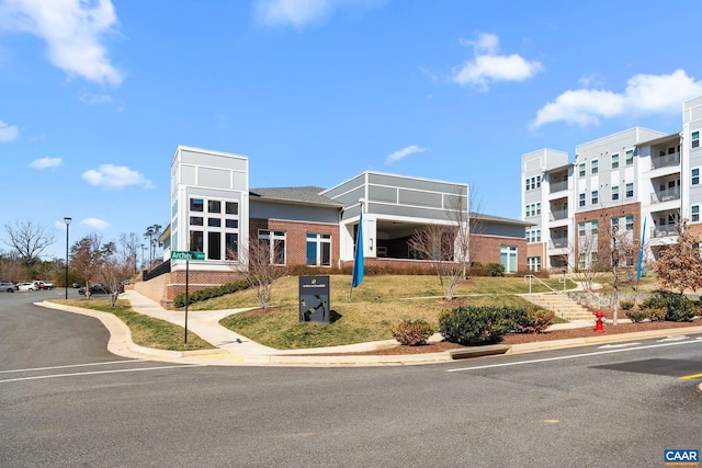 view of building exterior with stairs