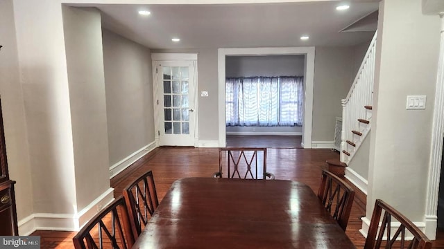 dining space featuring recessed lighting, wood finished floors, and baseboards