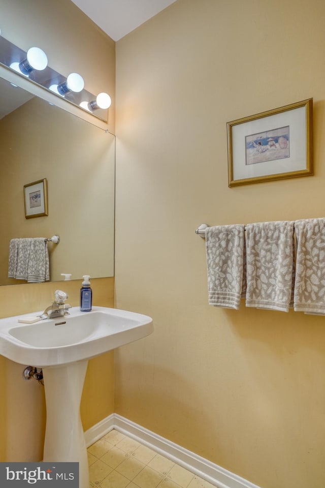 bathroom featuring baseboards