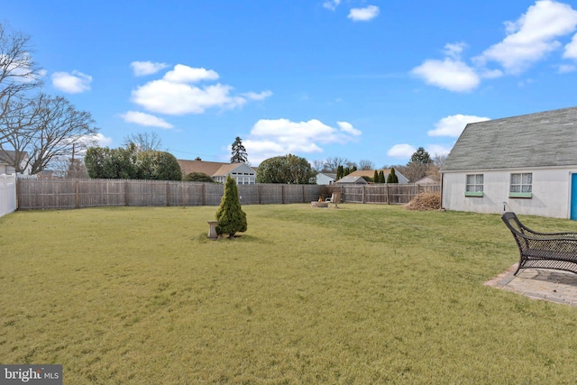 view of yard featuring a fenced backyard