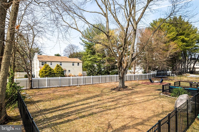 view of yard featuring a fenced backyard