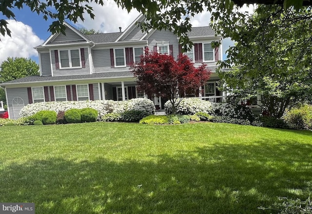 view of front of home with a front yard