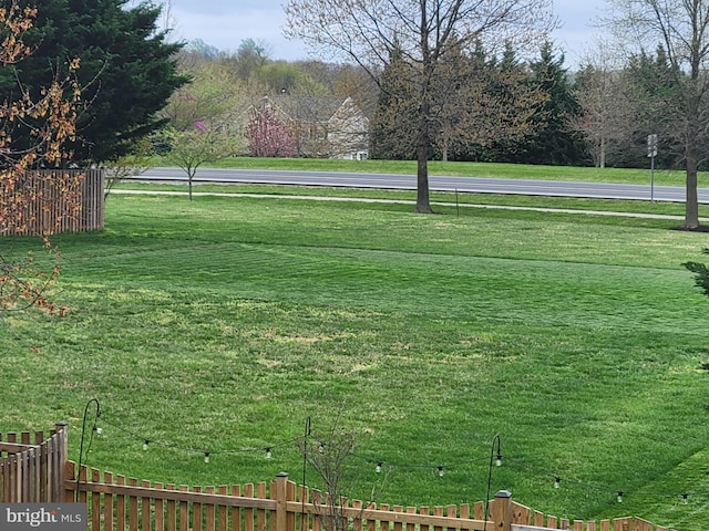 view of yard featuring fence