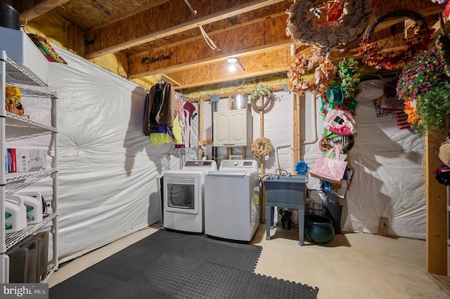 washroom with washing machine and clothes dryer