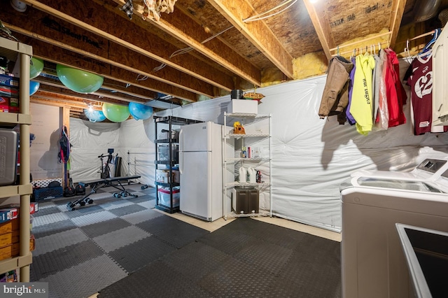 workout area featuring independent washer and dryer